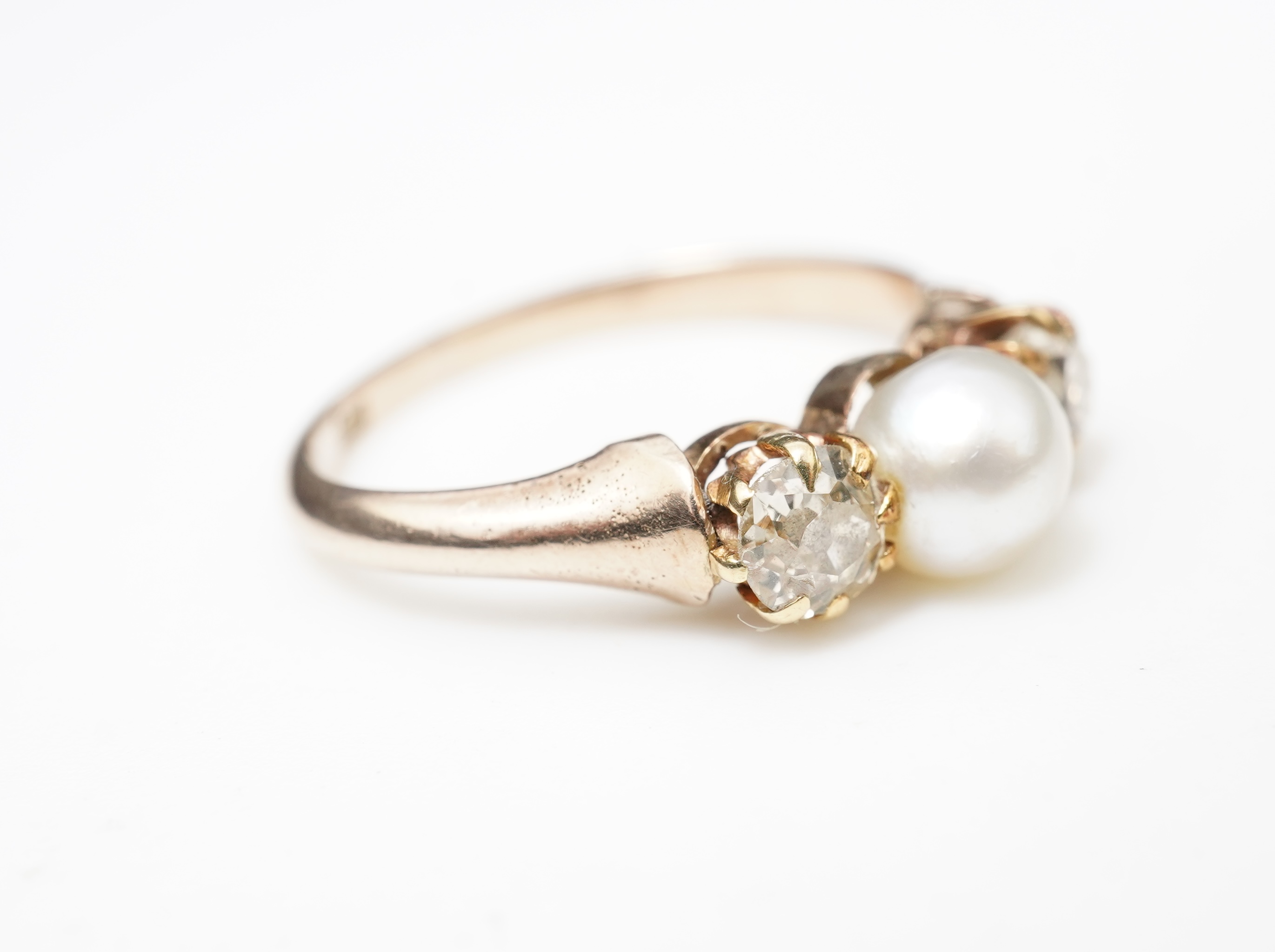 A late Victorian pearl and diamond ring, circa 1900